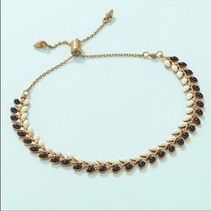 Stella & Dot Sarees Reversible Pulley bracelet, black and white to blood orange